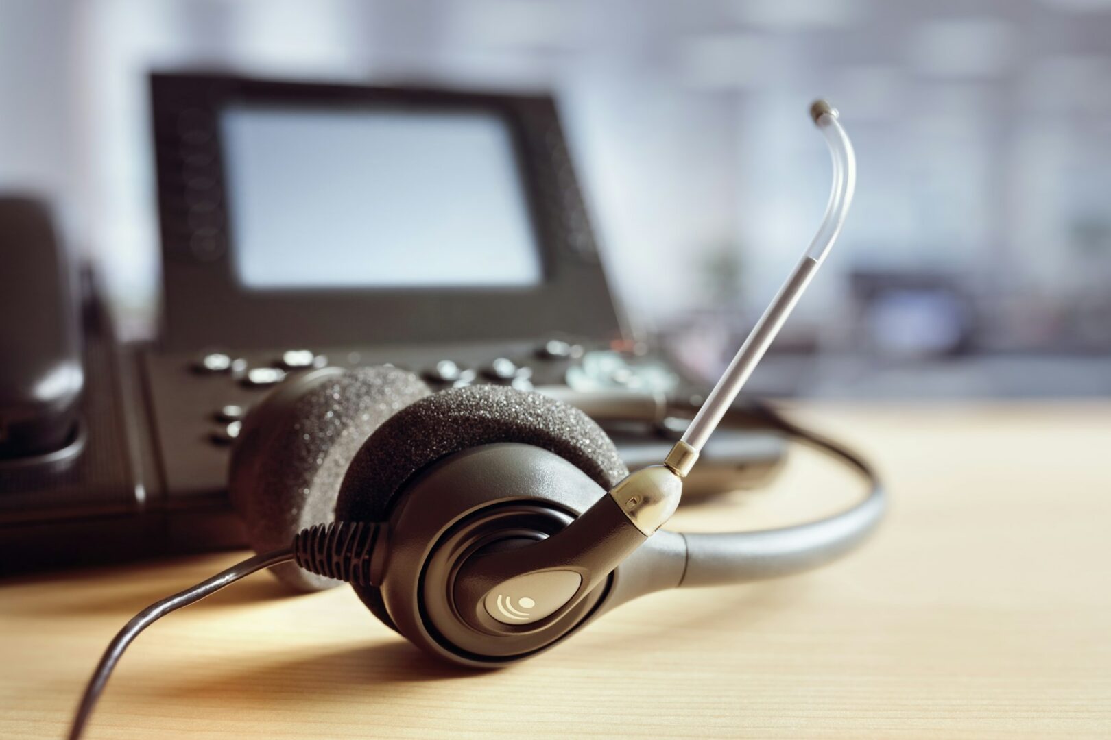 Technician installing telephony equipment